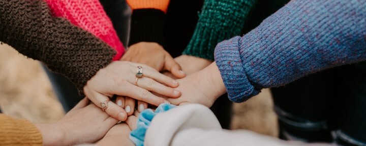 hands together stock photo